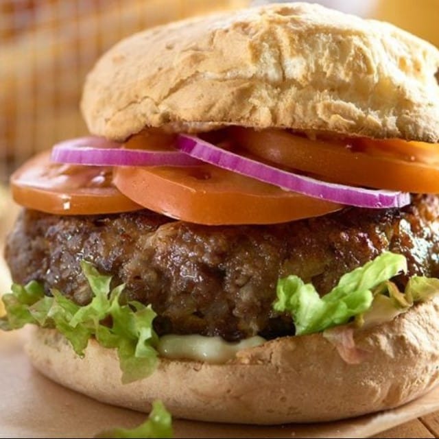 Beef burger in a gluten free bread roll Beef burger in a gluten free bread roll