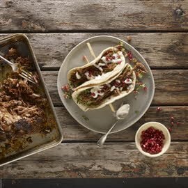 Makhani spiced lamb, cracked wheat salad and khobez
