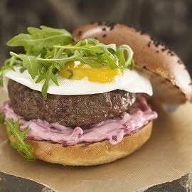 Australian burger with fried egg, beetroot and rocket Australian burger with fried egg, beetroot and rocket