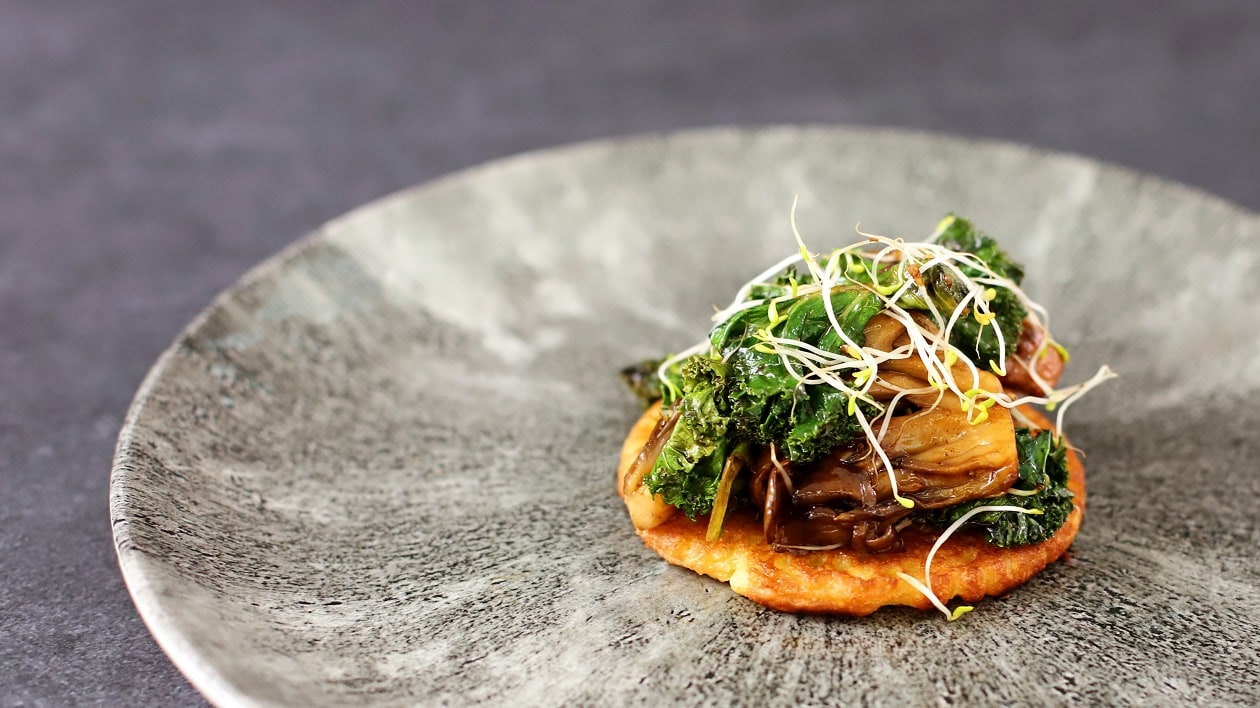 Sprouted chickpeas, socca pancake, kale, and BBQ maitake mushrooms – recipe