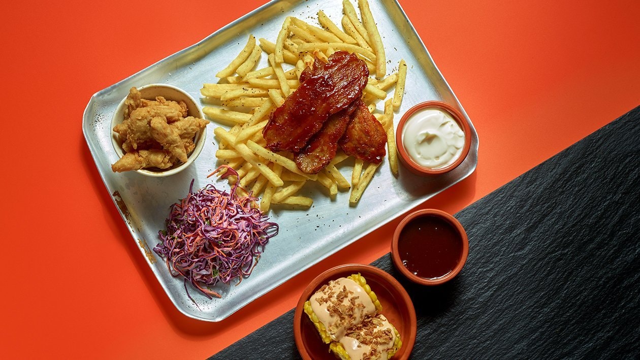 BBQ Seitan "belly" and buttermilk vegan nuggets with gravy, slaw and grilled corn – recipe