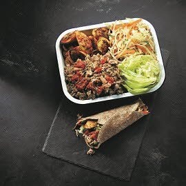 Jerk Pulled Jackfruit Roti with fried Plantain and Pineapple slaw